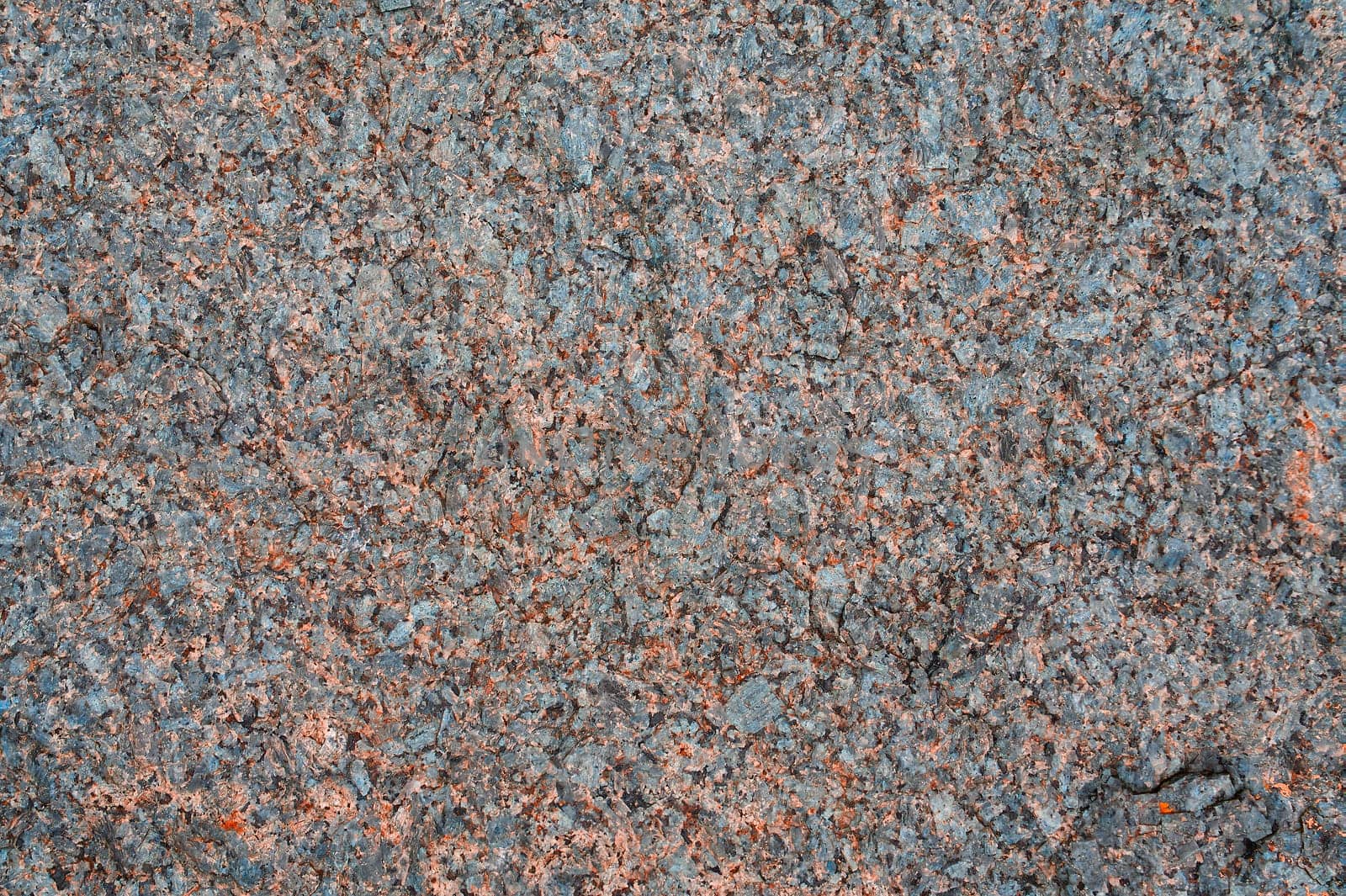 Granite texture, granite background with natural pattern. Natural granite stone. Red, gray and white granite stone texture