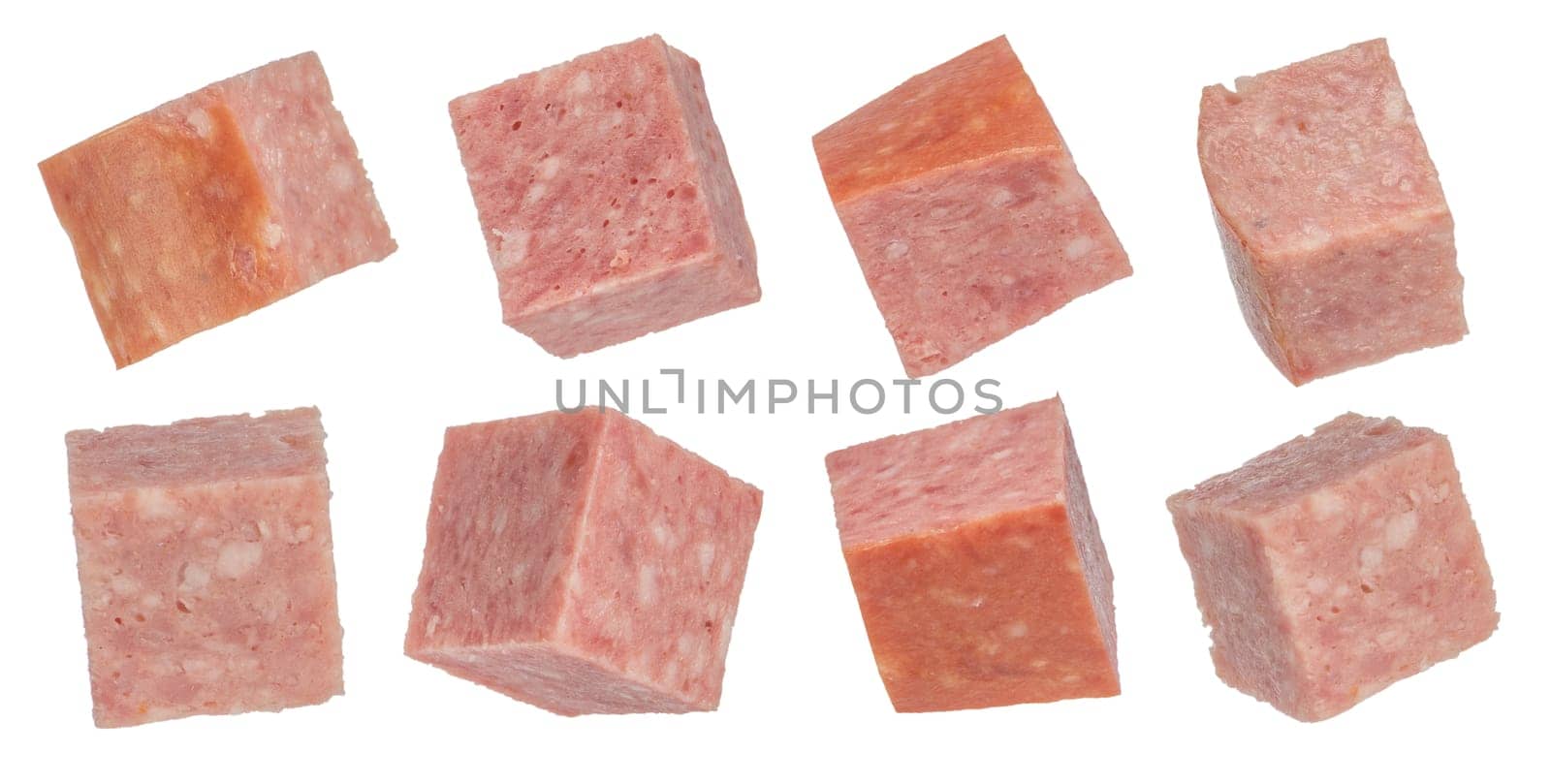 Smoked sausage isolate cut into squares. Salami sausage cubes on a white isolated background. For inserting into a design, project or product label creation