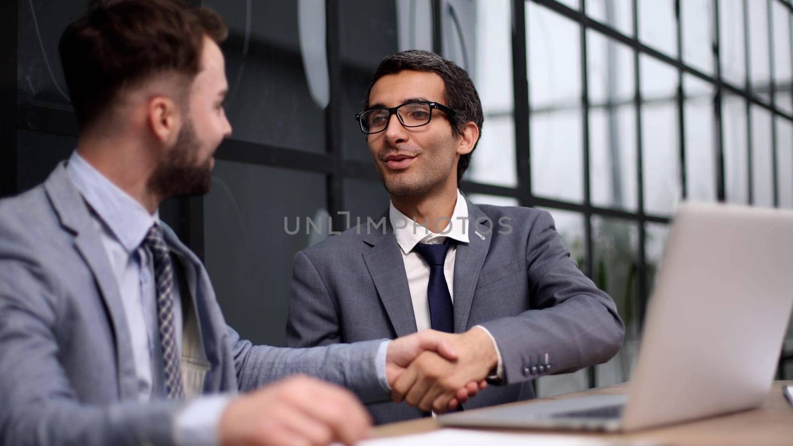 Let me explain. a group of corporate business colleagues having a meeting around the table in the boardroom.