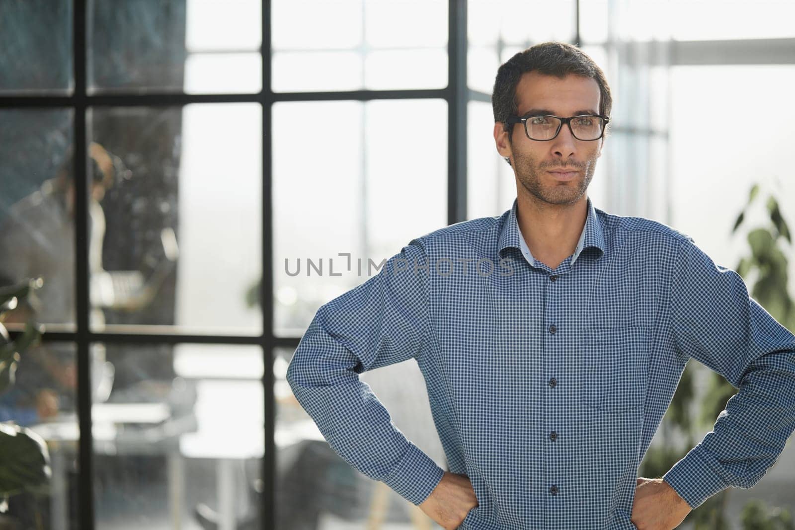 Confident businessman in casual wear in the office