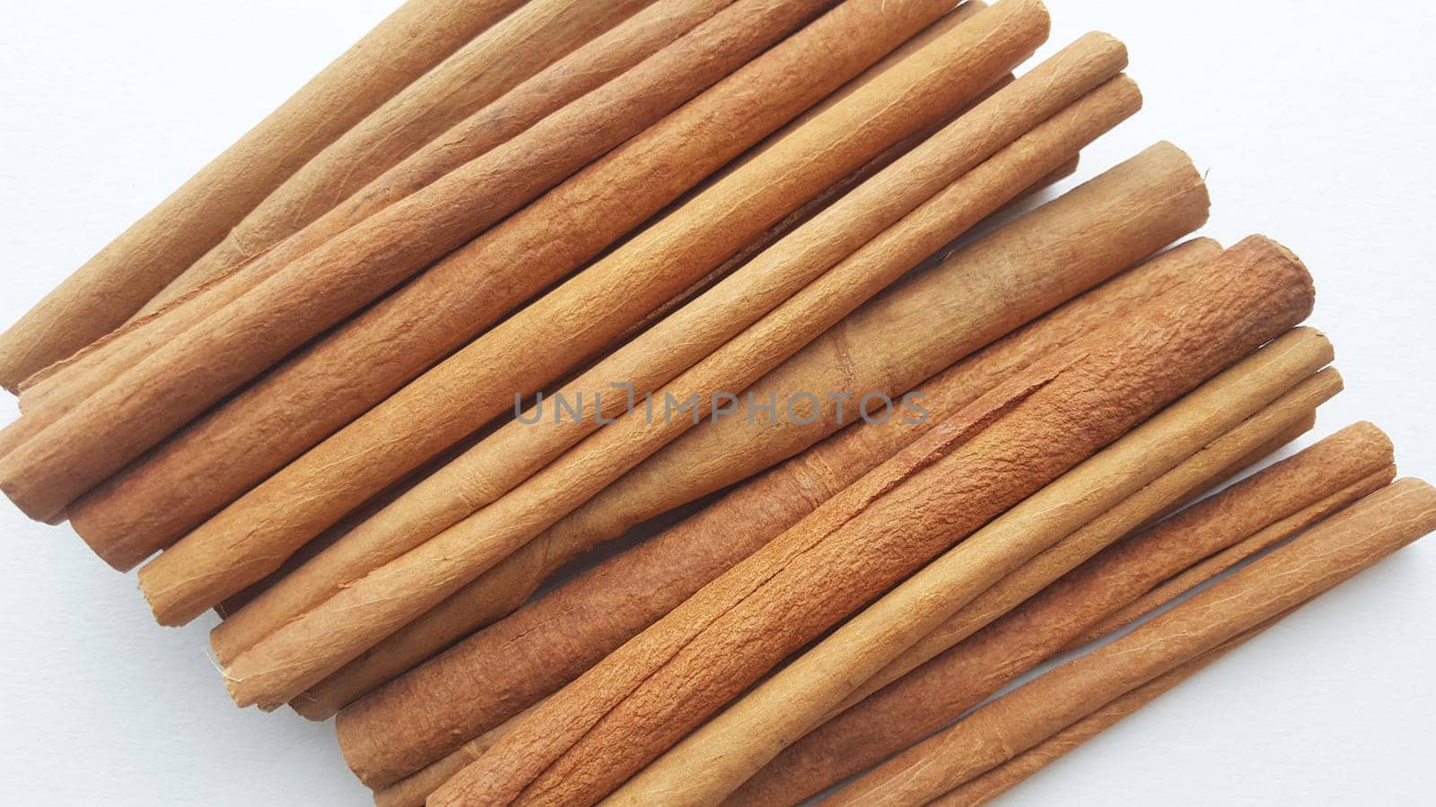 ingredient,dishware,metal,cinnamon,stick,cuisine,dish,staple,food,wood,rectangle,font,blue,linens,textile,thread,turquoise,wool