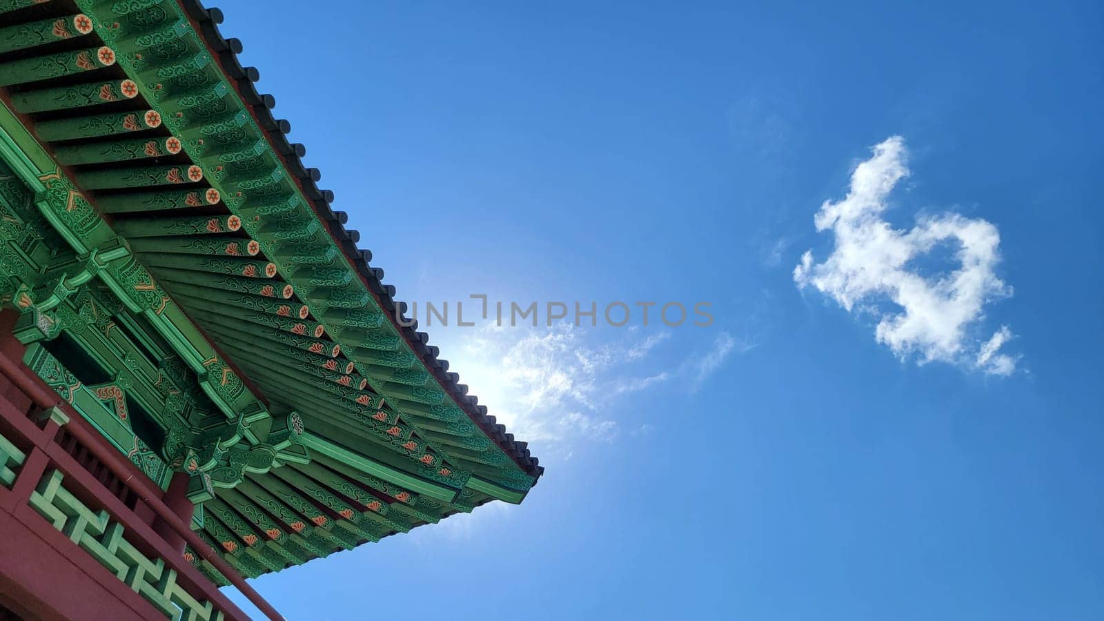 architecture,cloud,daytime,green,leaf,plant,roof,sky,sunlight,tree