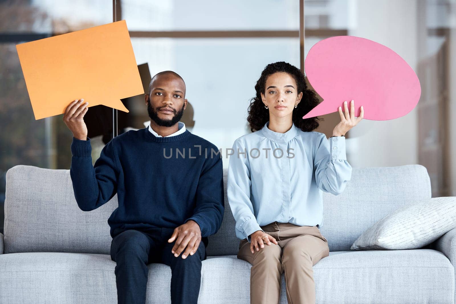 Black man, woman and speech bubble with space on sofa for opinion, idea or advice in portrait together for therapy. Psychology consultation, couch and poster for mock up, communication and support by YuriArcurs