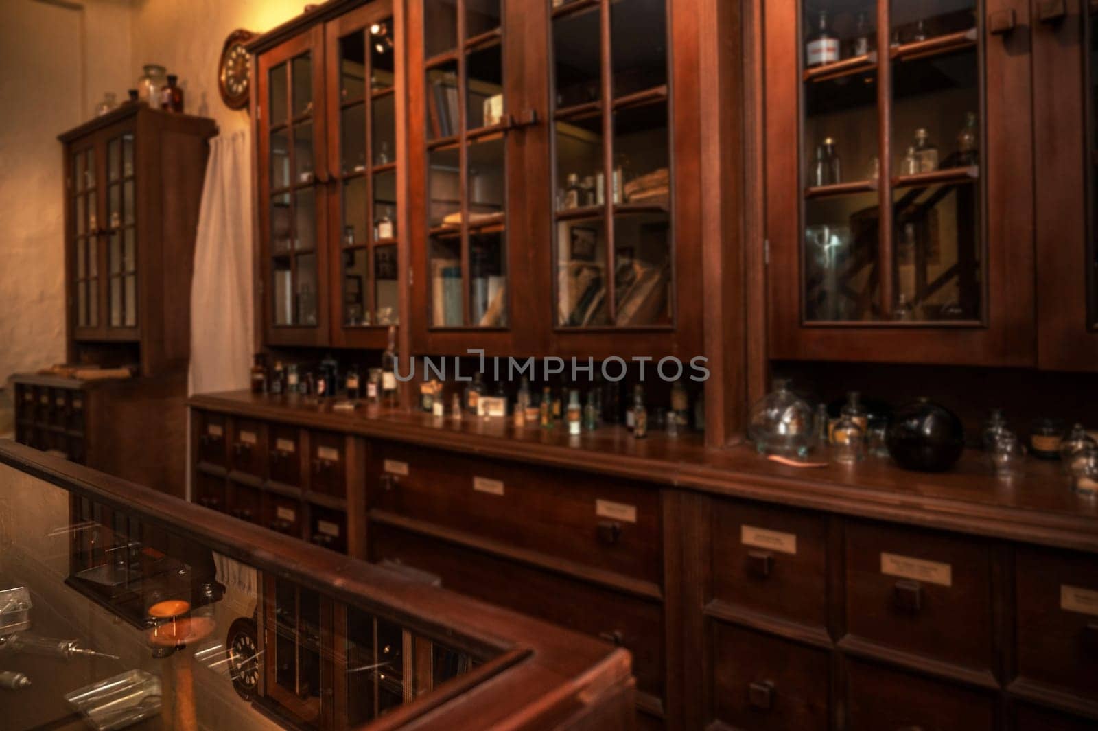 Vintage medications in old pharmacy, history concept background. Retro style.