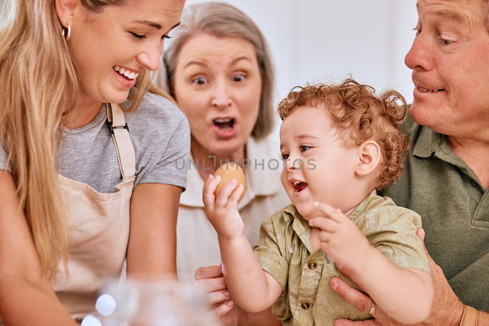 Family, kitchen and happy with baby, baking and bonding in home. Mother, smile and boy child cooking for happiness, love and time together with egg, fun and grandparents help for cookies in house by YuriArcurs