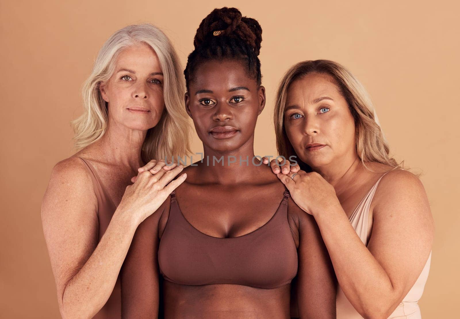 Women, natural body and diversity of beauty on studio background for skincare, cosmetics and empowerment. Portrait female group of people in underwear together for self love, community and confidence.