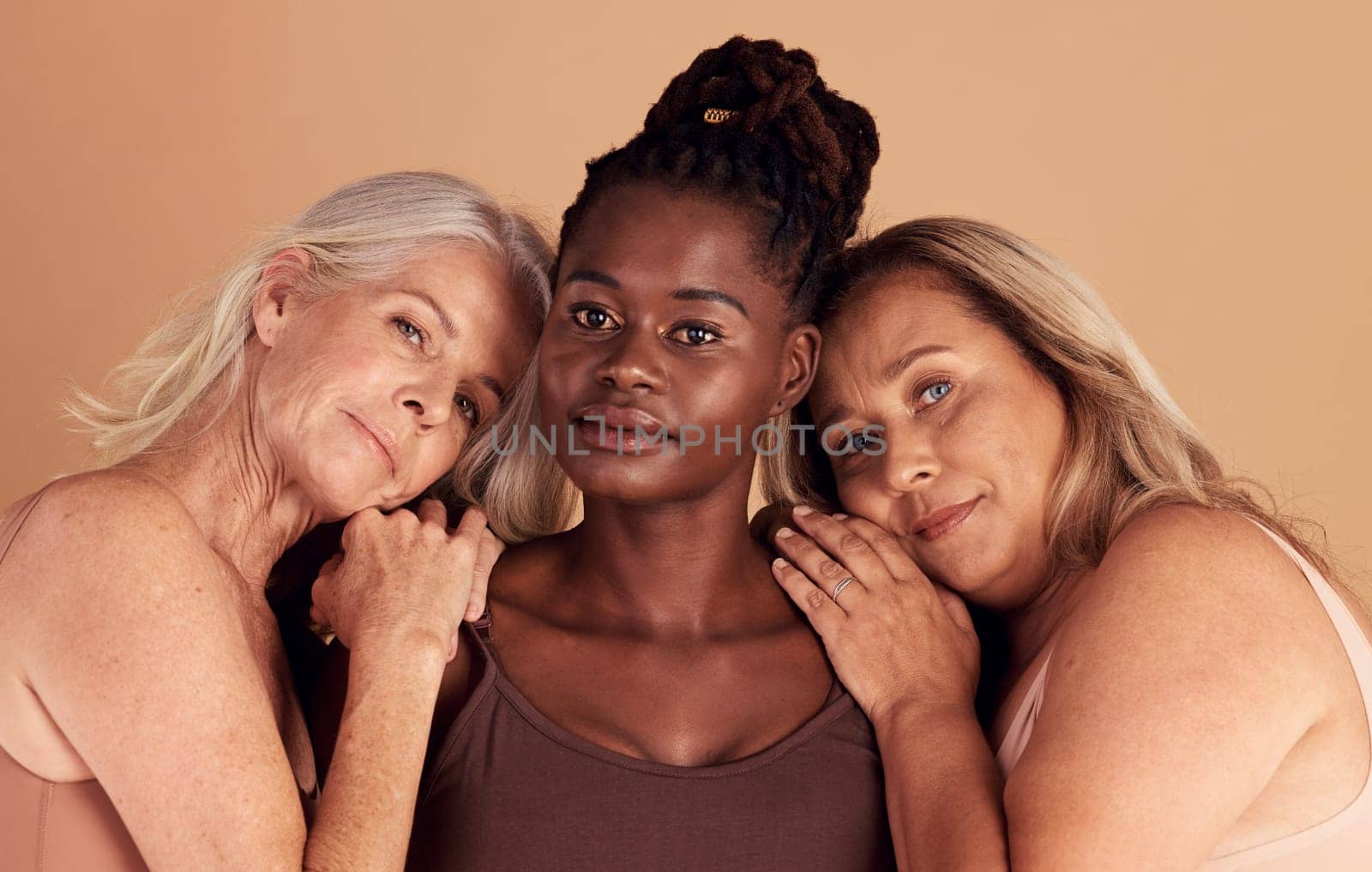 Skincare, diversity and group of mature women with natural body, healthy and glowing skin in studio. Beauty, spa and portrait of older female models pose for beauty products, cosmetics and wellness by YuriArcurs