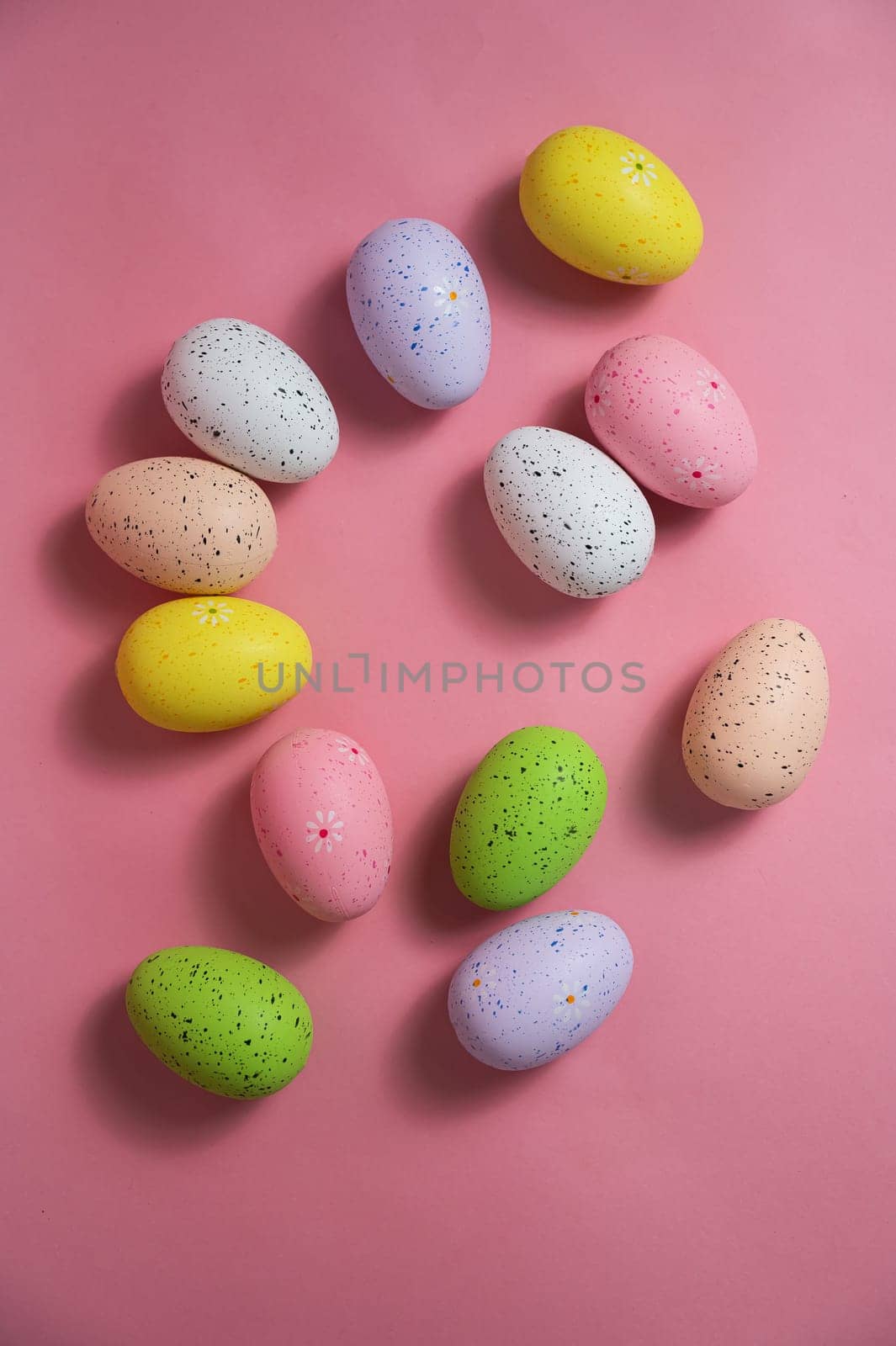 Painted quail eggs on a pink background. Easter decorations. by mrwed54