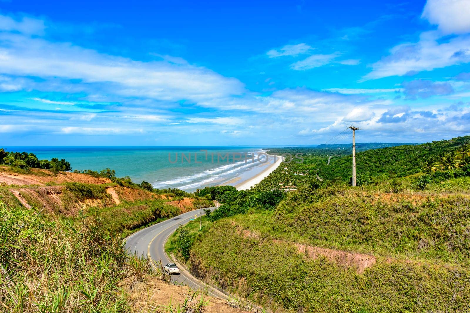 Road along the coast of the state of Bahia next to the beaches of Pe de Serra and Sargi in Serra Grande