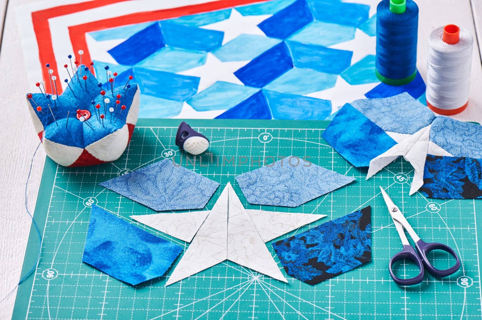 Sewing of quilt with stylized elements of American flag
