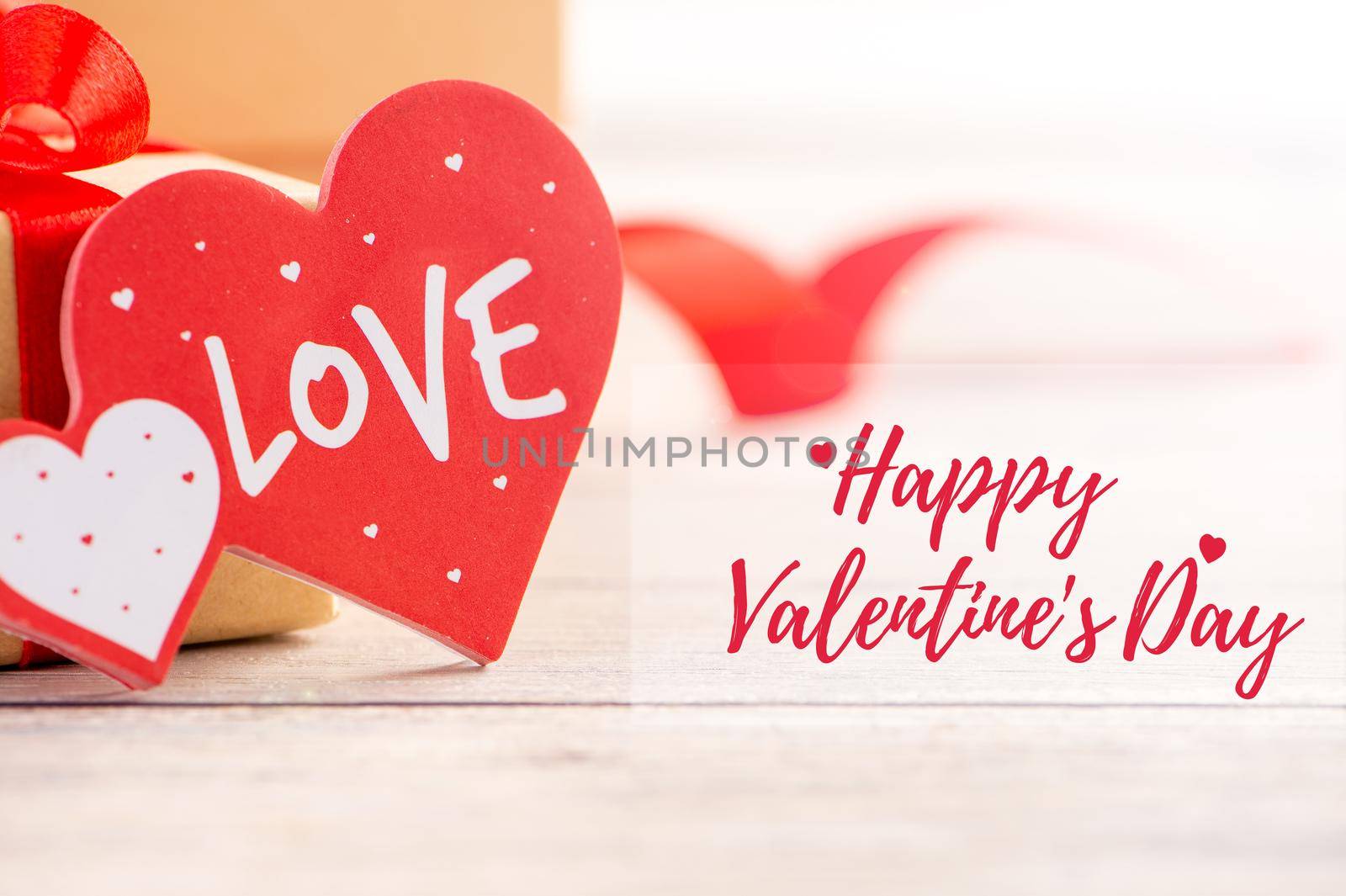 Valentine's Day holiday greeting card, promotion sale design concept with red text, heart shape decoration for happy love, bokeh background, close up.