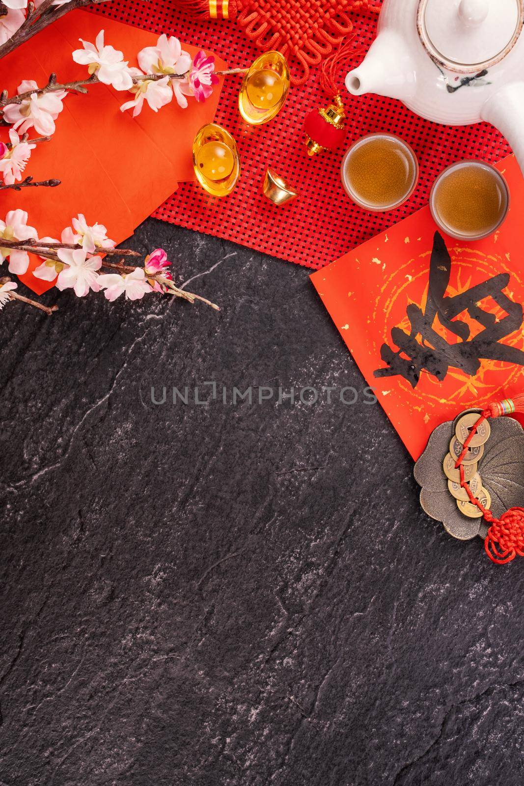 Design concept of Chinese lunar January new year - Festive accessories, red envelopes (ang pow, hong bao), top view, flat lay, overhead above. The word 'chun' means coming spring. by ROMIXIMAGE