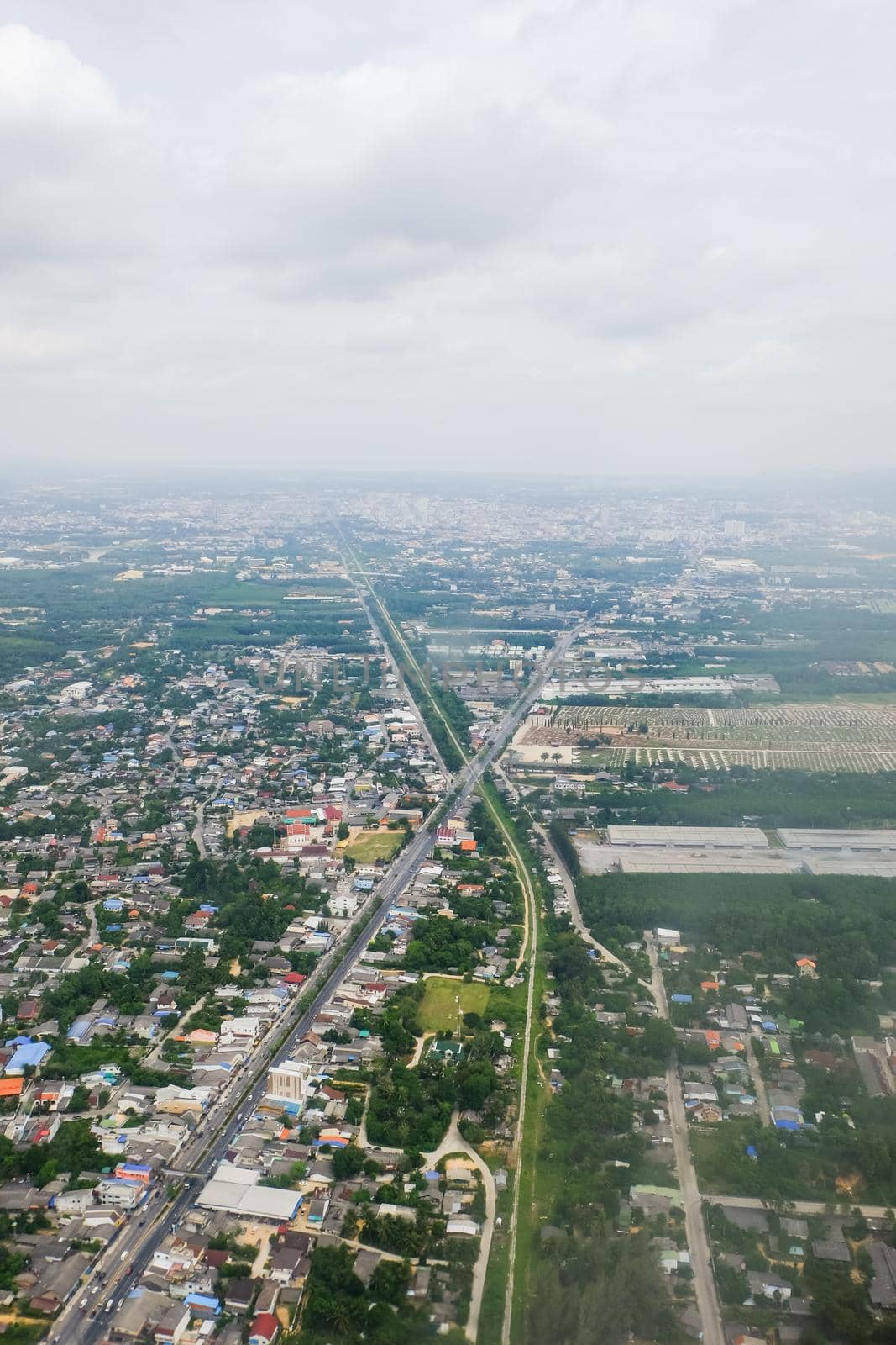 bird eye view at the city, view form airplane by Wmpix