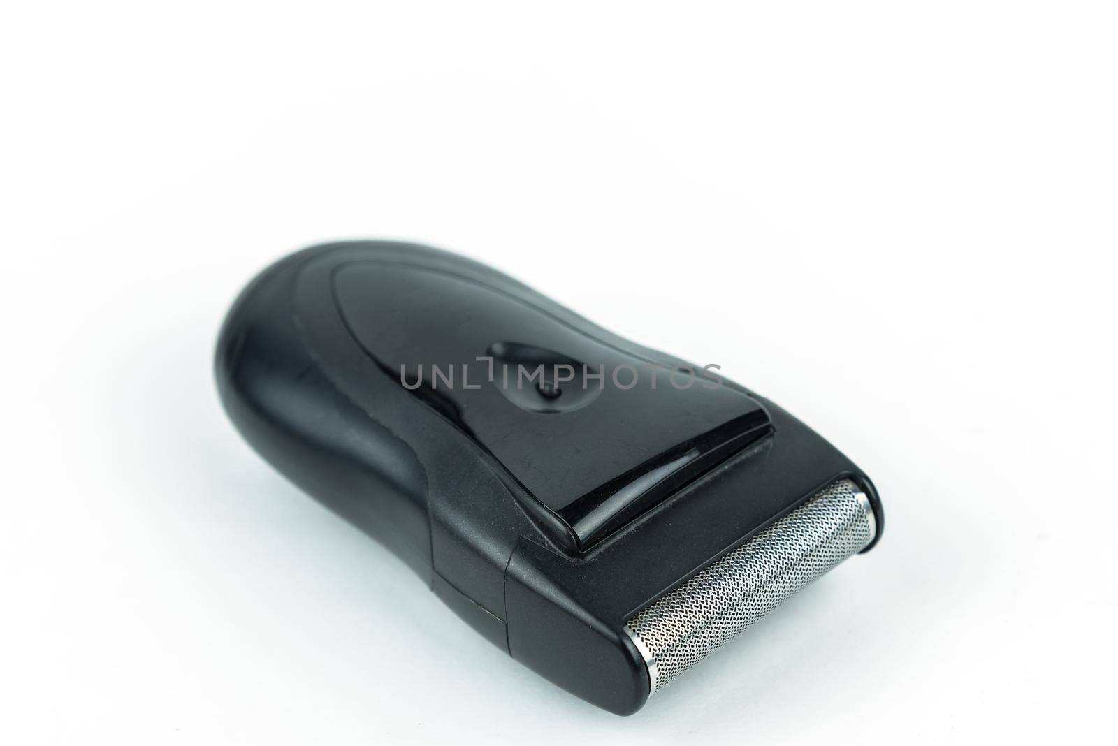Electric shaver over white background by Wmpix