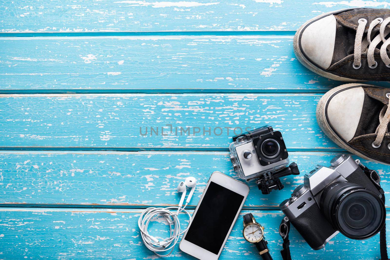 Top view of Traveler's accessories, Flat lay photography of Travel concept on blue background