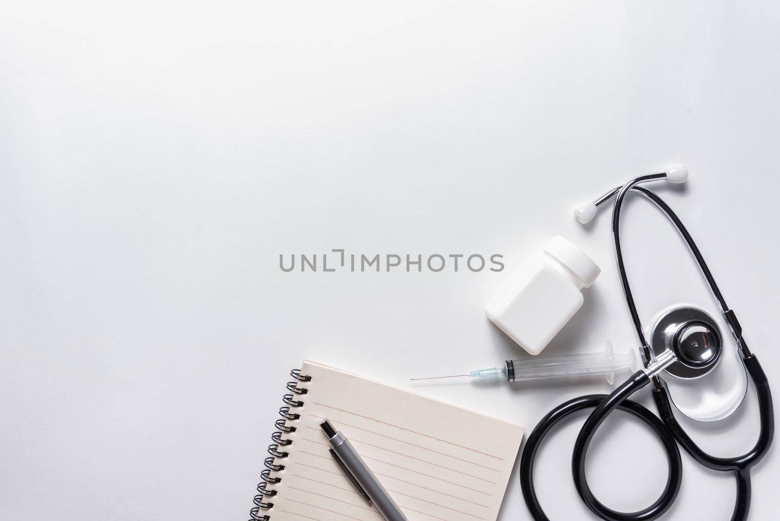 Flat lay aerial of tools medical & Healthcare insurance background concept by Wmpix