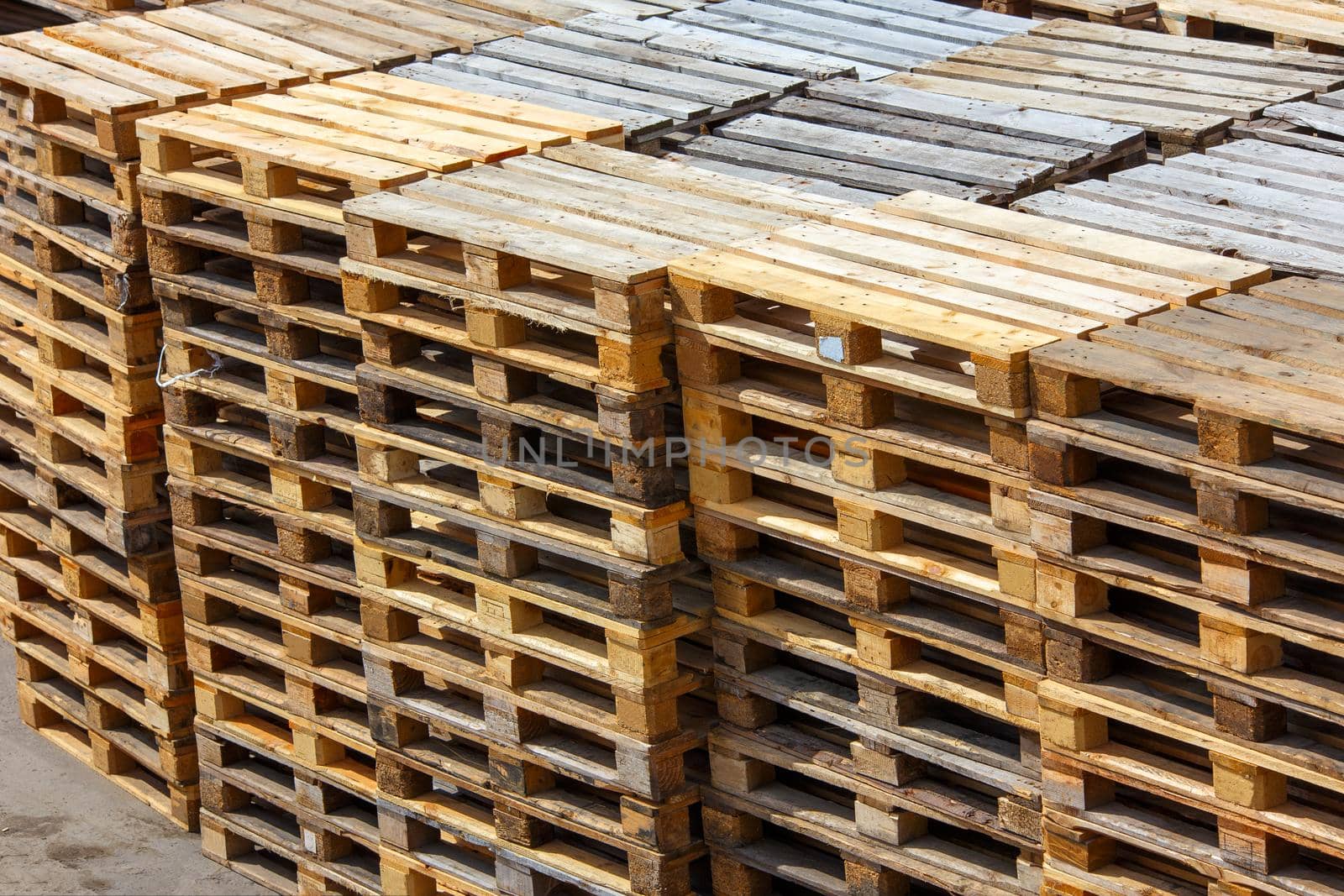 used wooden pallet stacks - perspective view from above.
