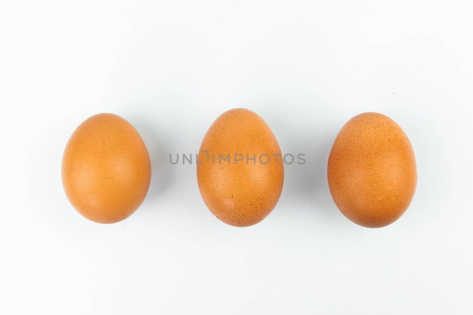 eggs isolated on white background by Wmpix