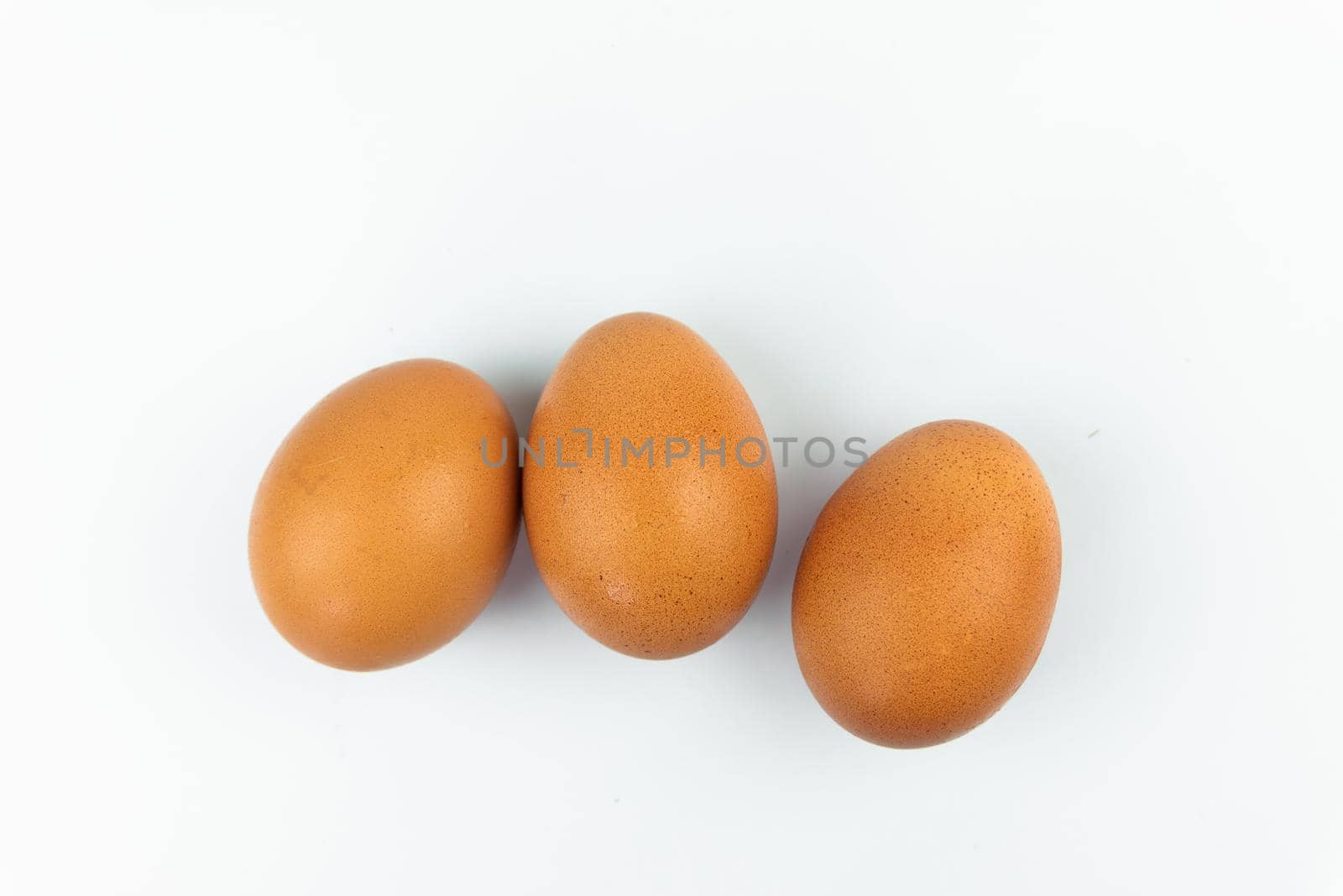 eggs isolated on white background by Wmpix