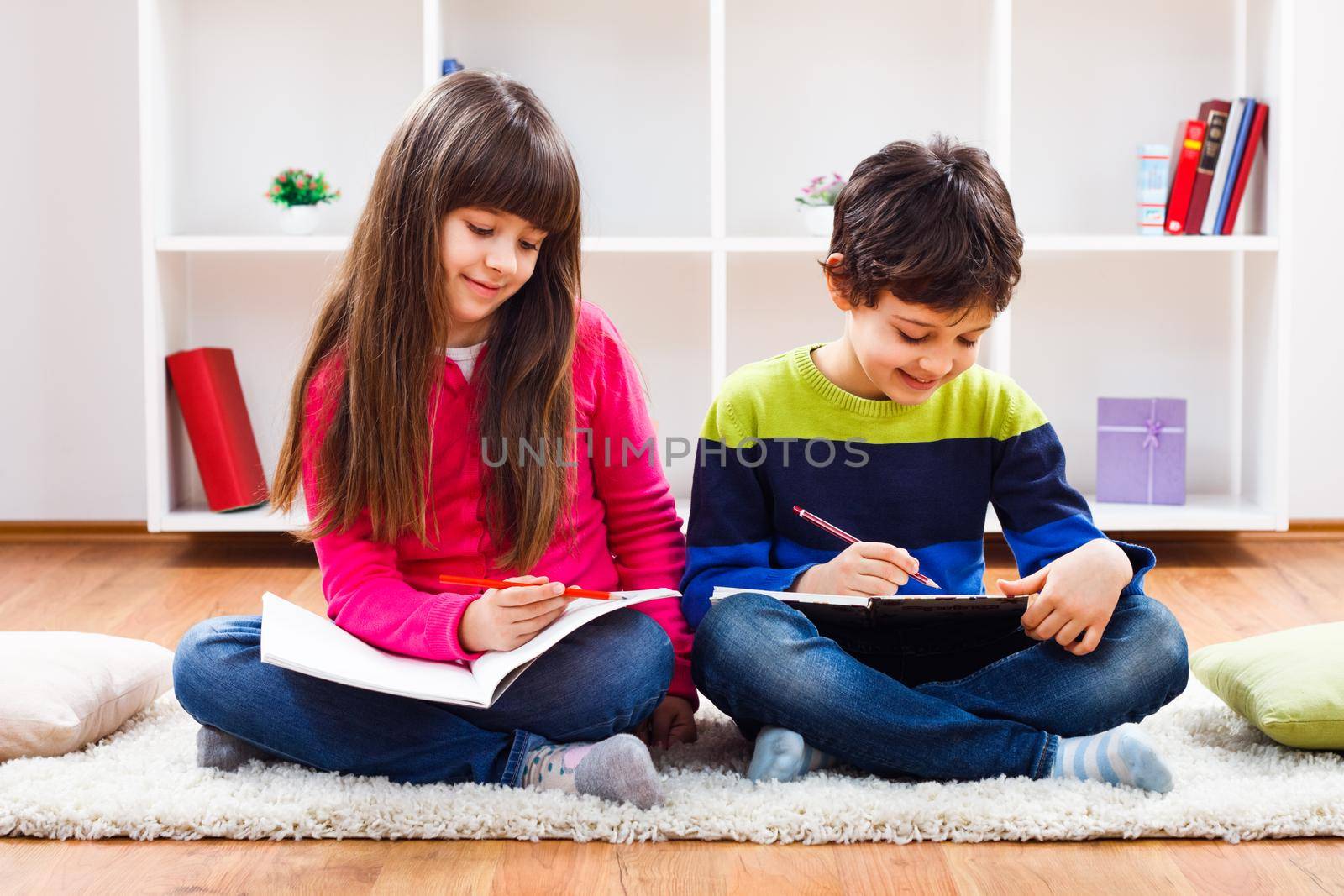Image of children doing homework.