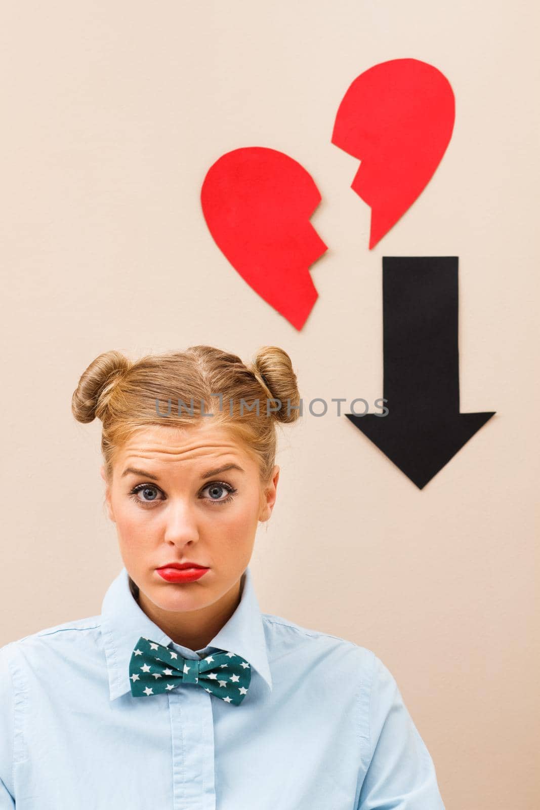 Nerdy woman is sad because someone broke her heart.
