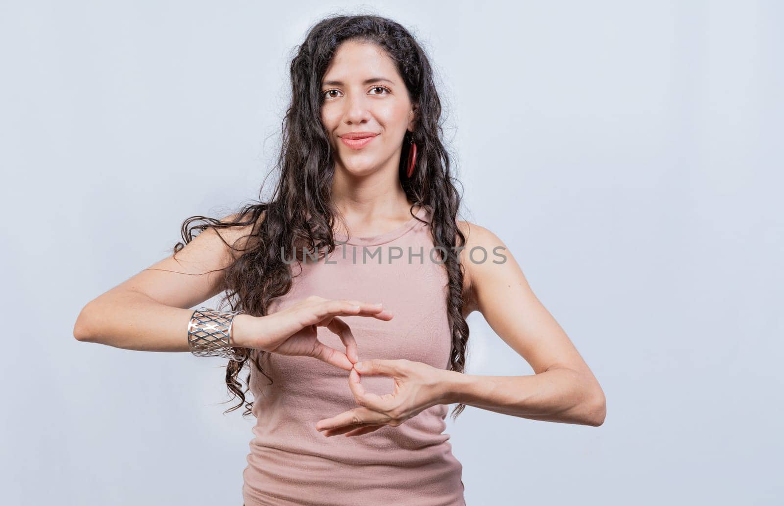 People speaking in sign language isolated. Young woman gesturing in sign language, Lating girl gesturing in sign language isolated