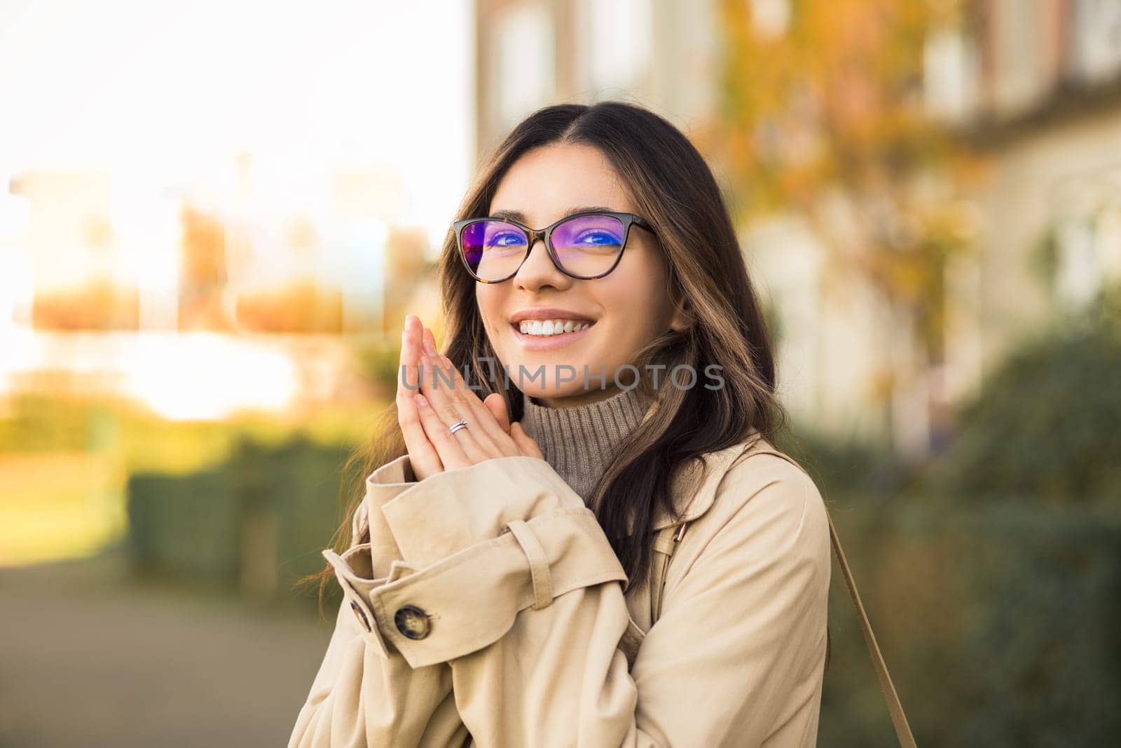 Curious young student visualising her future, dreaming and planning woman 20s with glasses.