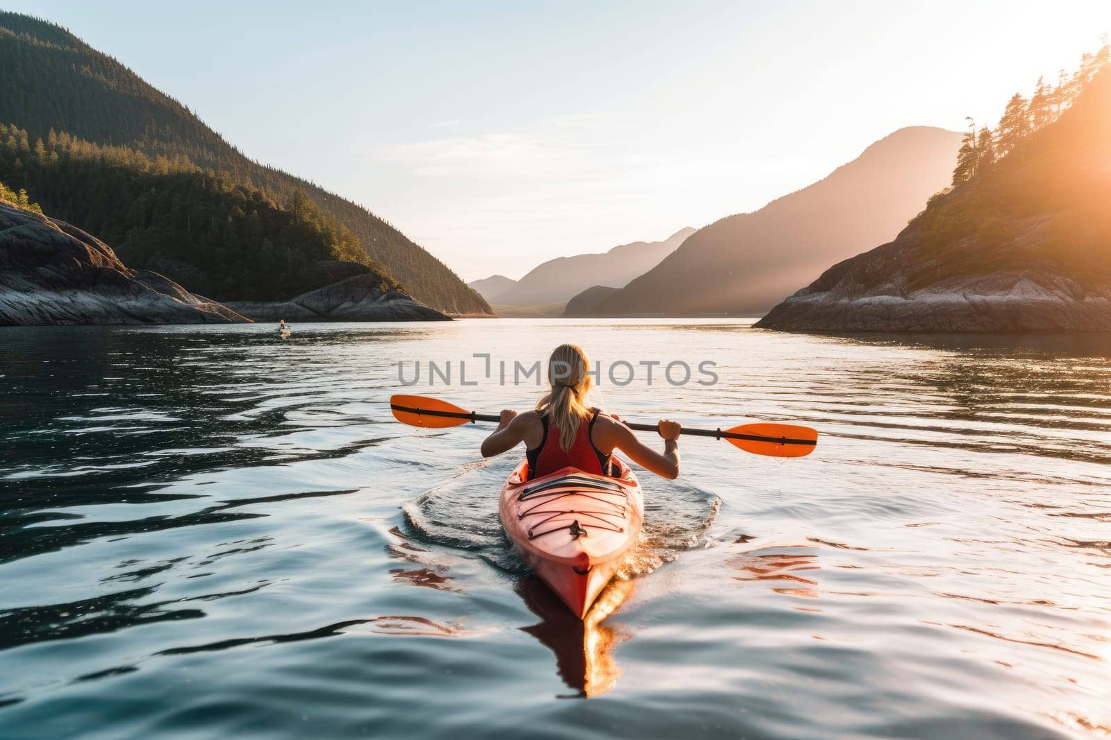 Enjoying summer day on the lake. Rear view of woman kayaking at mountain lake. AI Generative