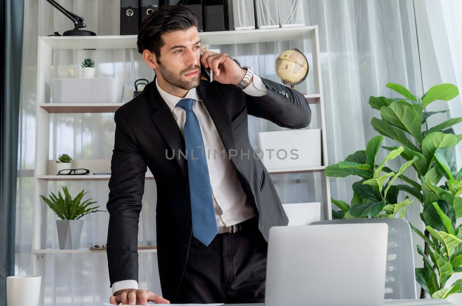 Businessman making a sales call with clients at office. fervent by biancoblue