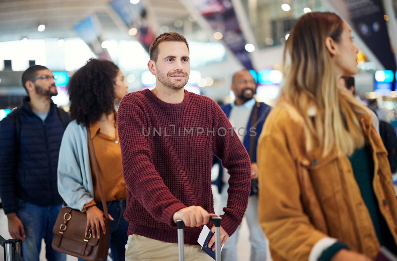 Travel, queue and smile with man in airport for vacation, international trip and tourism. Holiday, luggage and customs with passenger in line for ticket, departure and flight transportation.