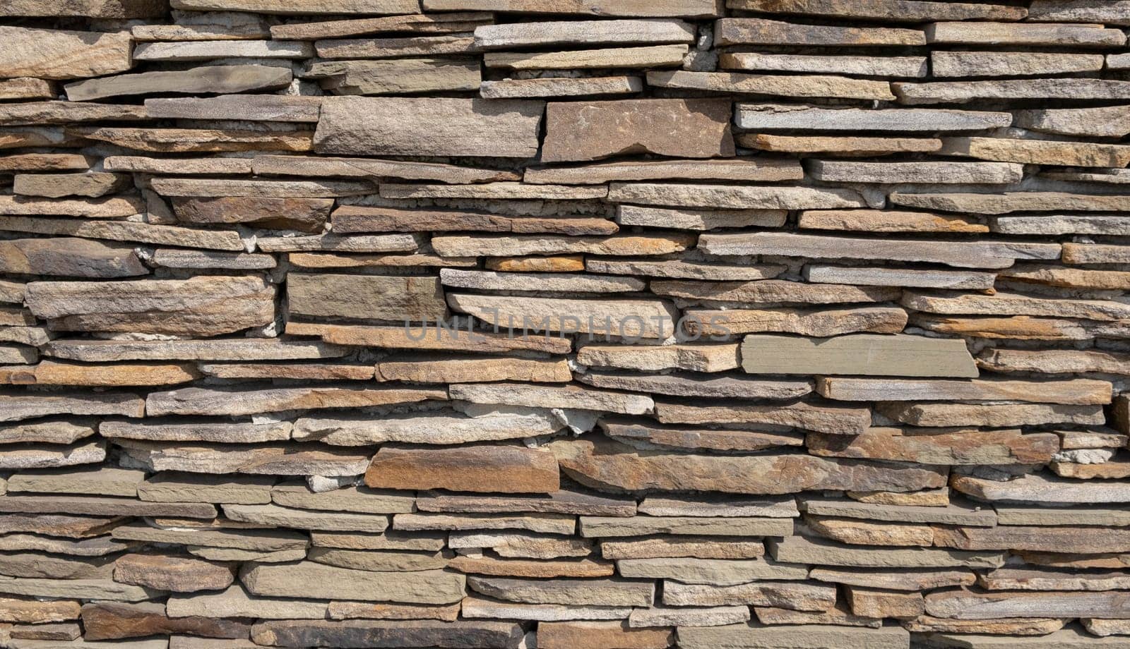 Wall from flat stones stacked on top of each other by igor010