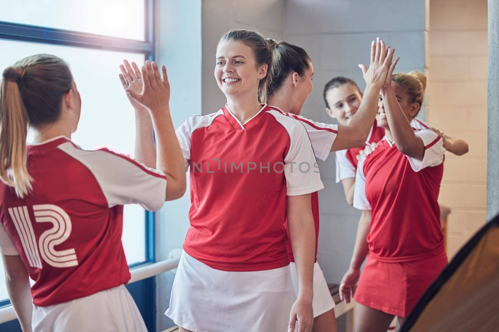 Girl team, sport and high five for celebration, congratulations and achievement of goal with happiness. Women, teamwork and sports success with smile, happy and together for motivation for game by YuriArcurs