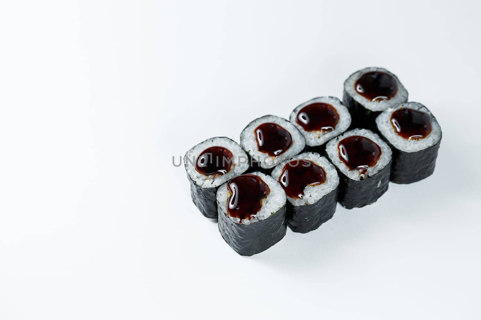 Japanese traditional food. Sushi rolls with fresh tuna avocado and cream cheese and soy sauce