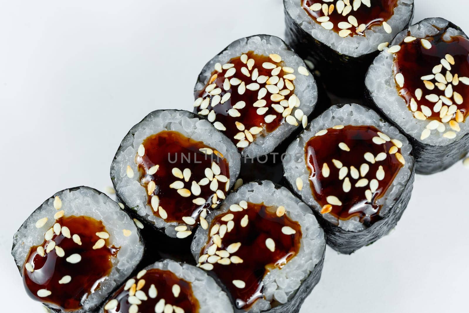 Japanese traditional food. Sushi rolls with fresh tuna avocado and cream cheese and soy sauce