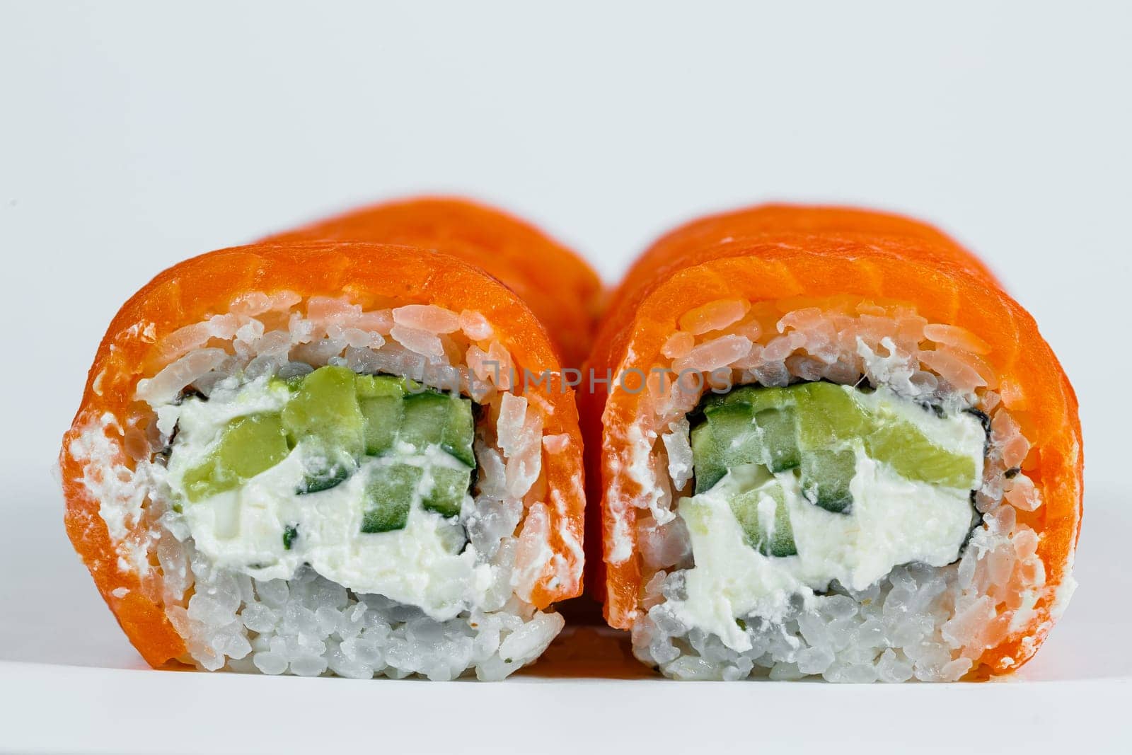 Sushi rolls philadelphia classic with fresh salmon and cream cheese. Japanese traditional food
