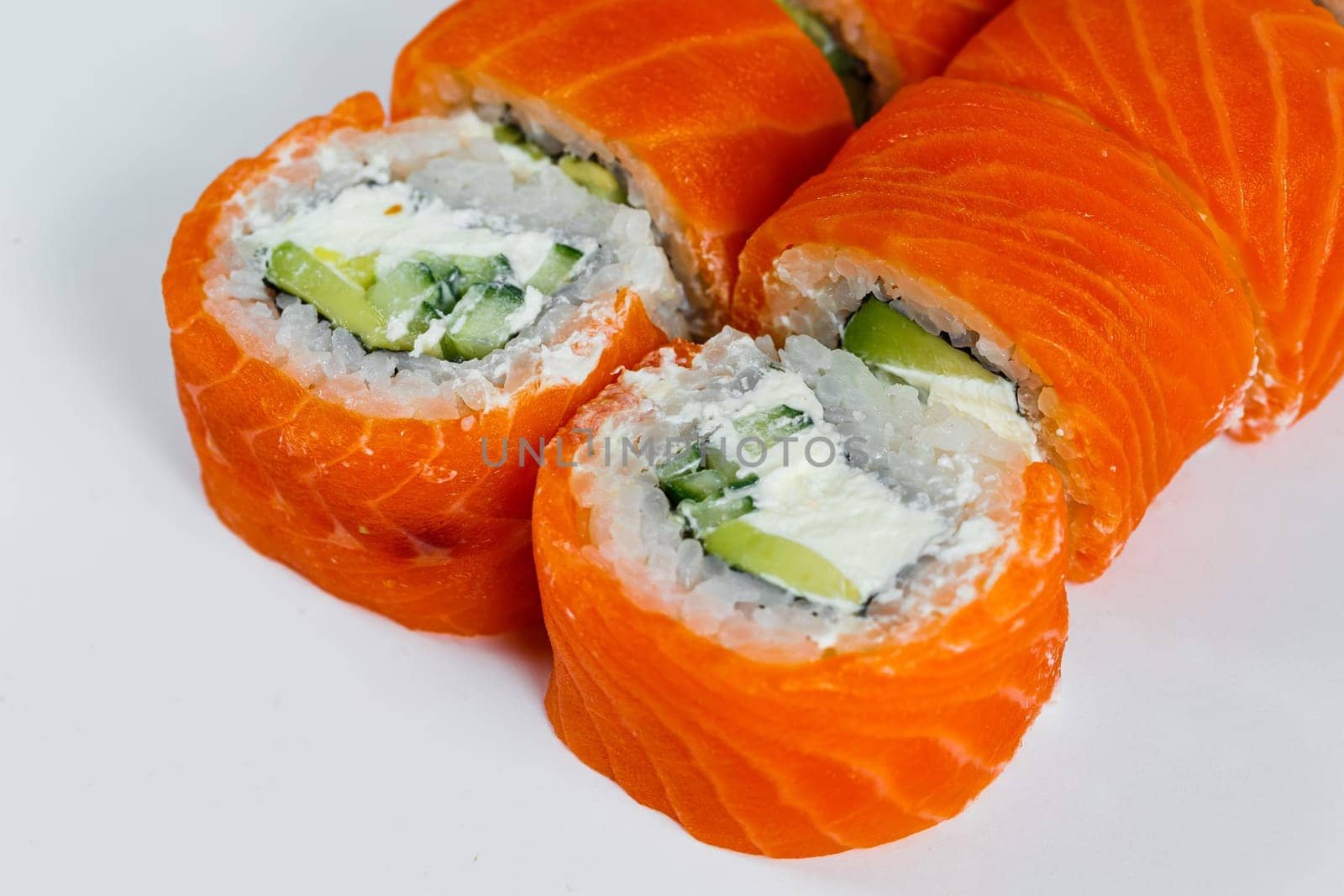 Sushi rolls philadelphia classic with fresh salmon and cream cheese. Japanese traditional food