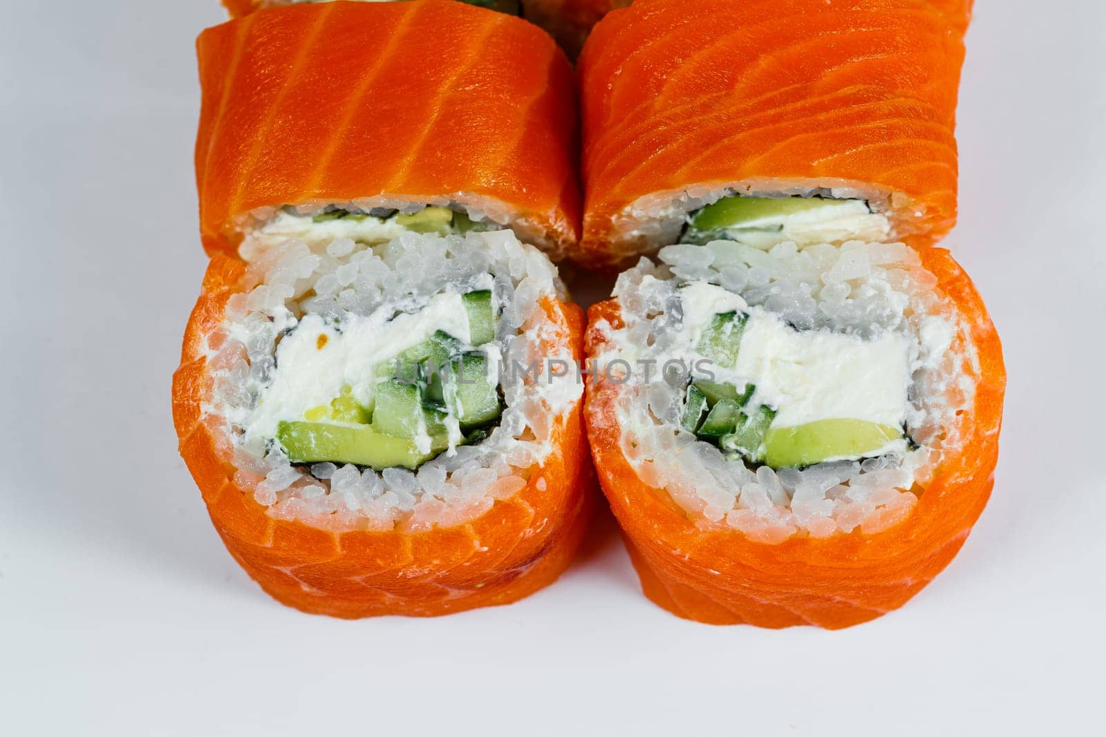 Sushi rolls philadelphia classic with fresh salmon and cream cheese. Japanese traditional food