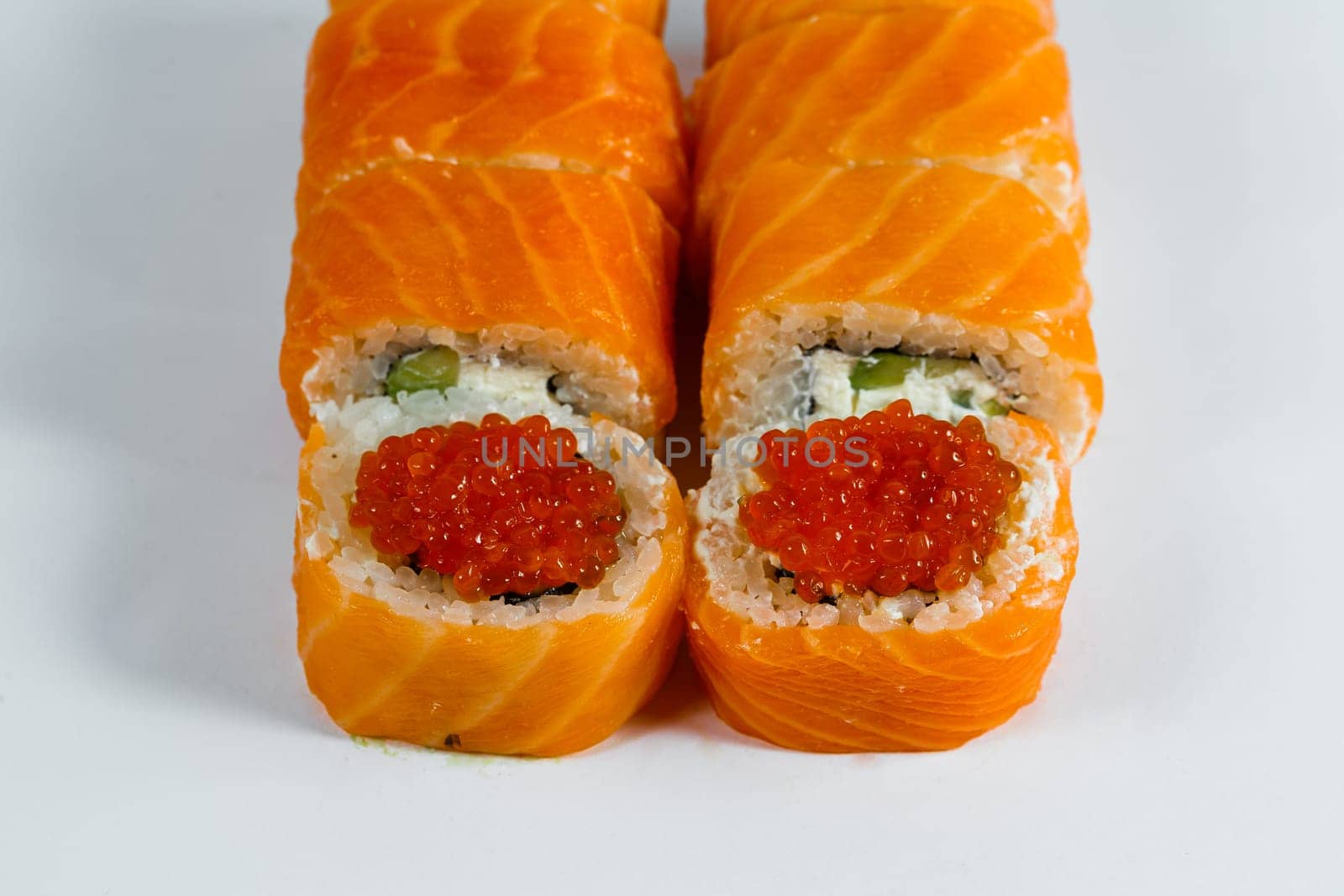 Japanese traditional food. Sushi rolls philadelphia classic with fresh salmon and cream cheese and caviar