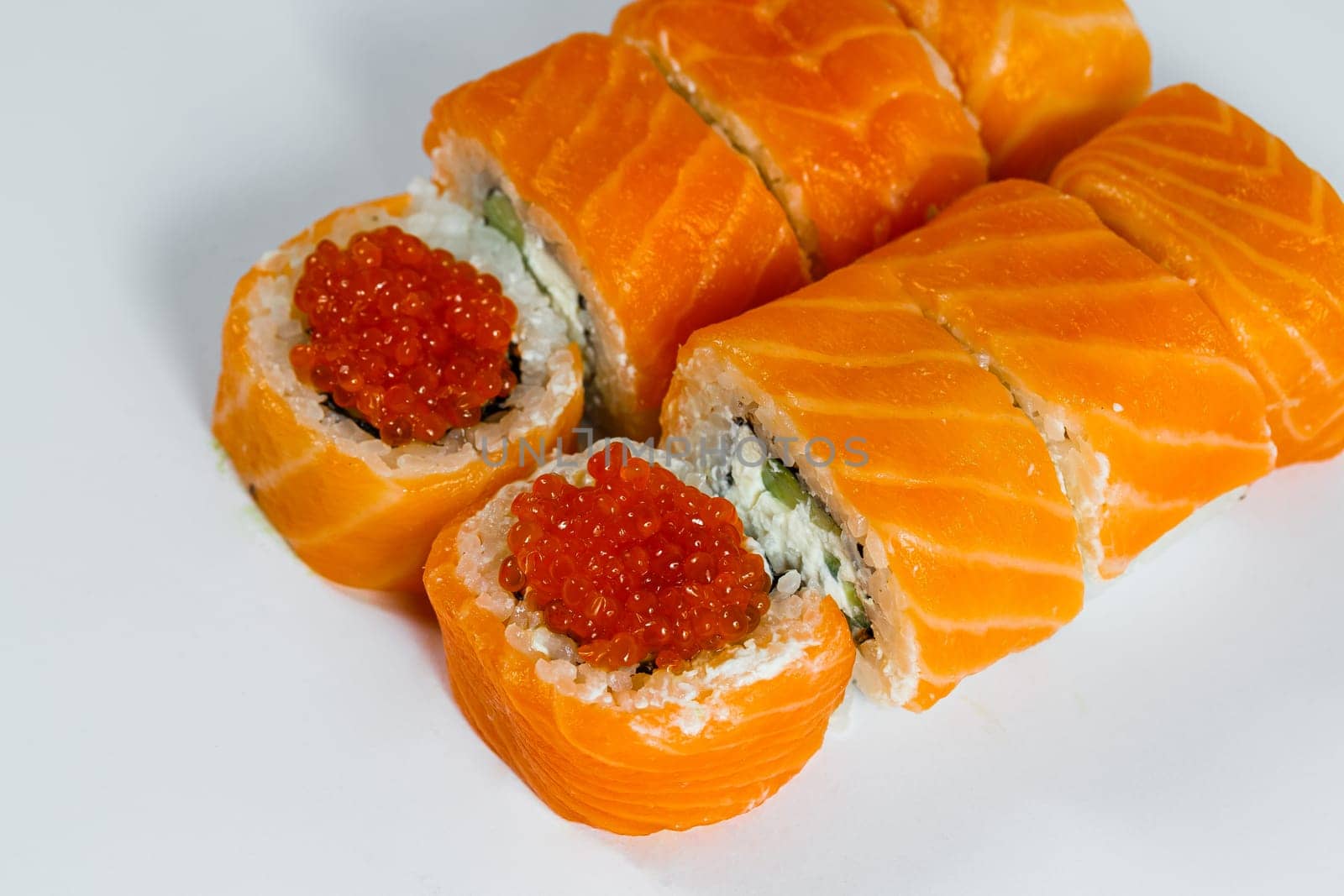 Japanese traditional food. Sushi rolls philadelphia classic with fresh salmon and cream cheese and caviar