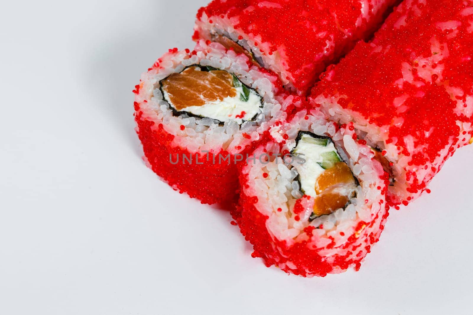 Japanese traditional food. Sushi rolls philadelphia with fresh avocado caviar and cream cheese