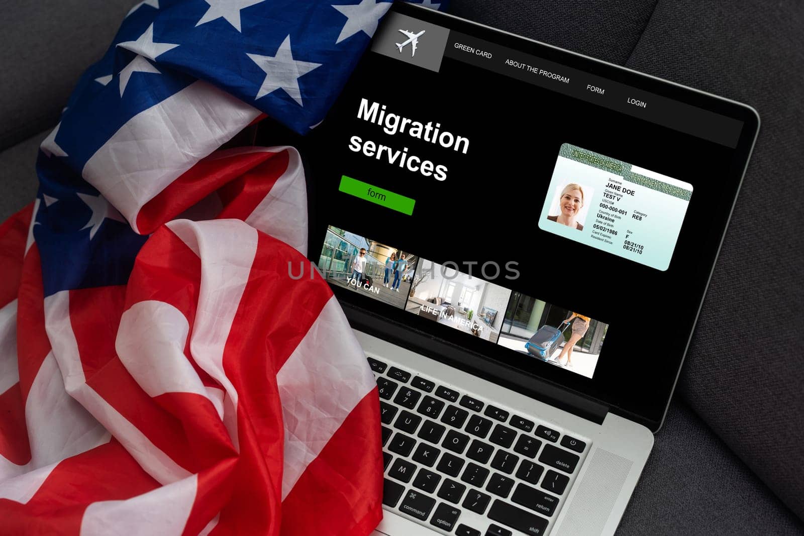 laptop from the migration center, usa flag by Andelov13