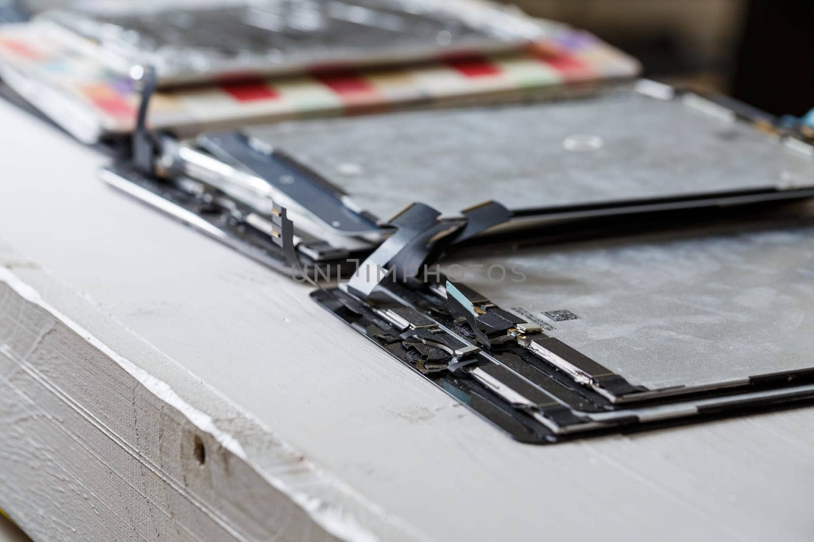 Tablet repair, replacement of glass on the tablet. Broken glass on a mobile device