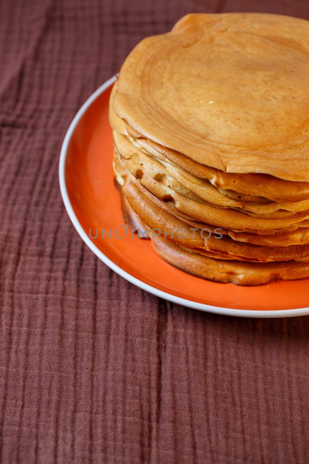 Delicious homemade fried pancakes with natural ingredients, plate with homemade pancakes