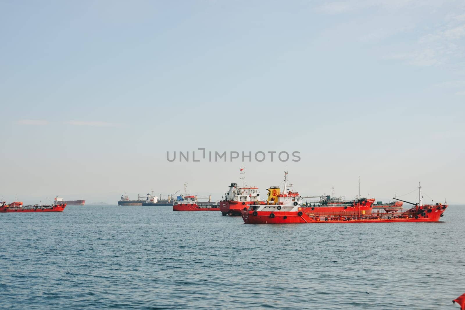 Istanbul, Turkey, May 02, 2023: Cargo ships pass through the Bosphorus, Istanbul by Ekaterina34