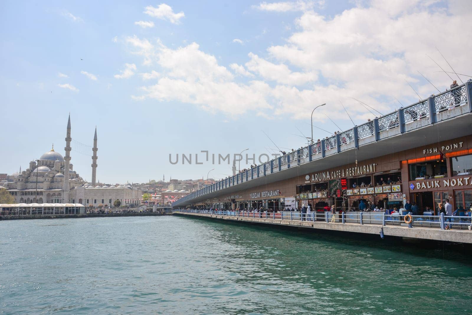 Istanbul, Turkey, May 02, 2023: View of the mosque in cloudy weather over the Bosphorus and Kadika