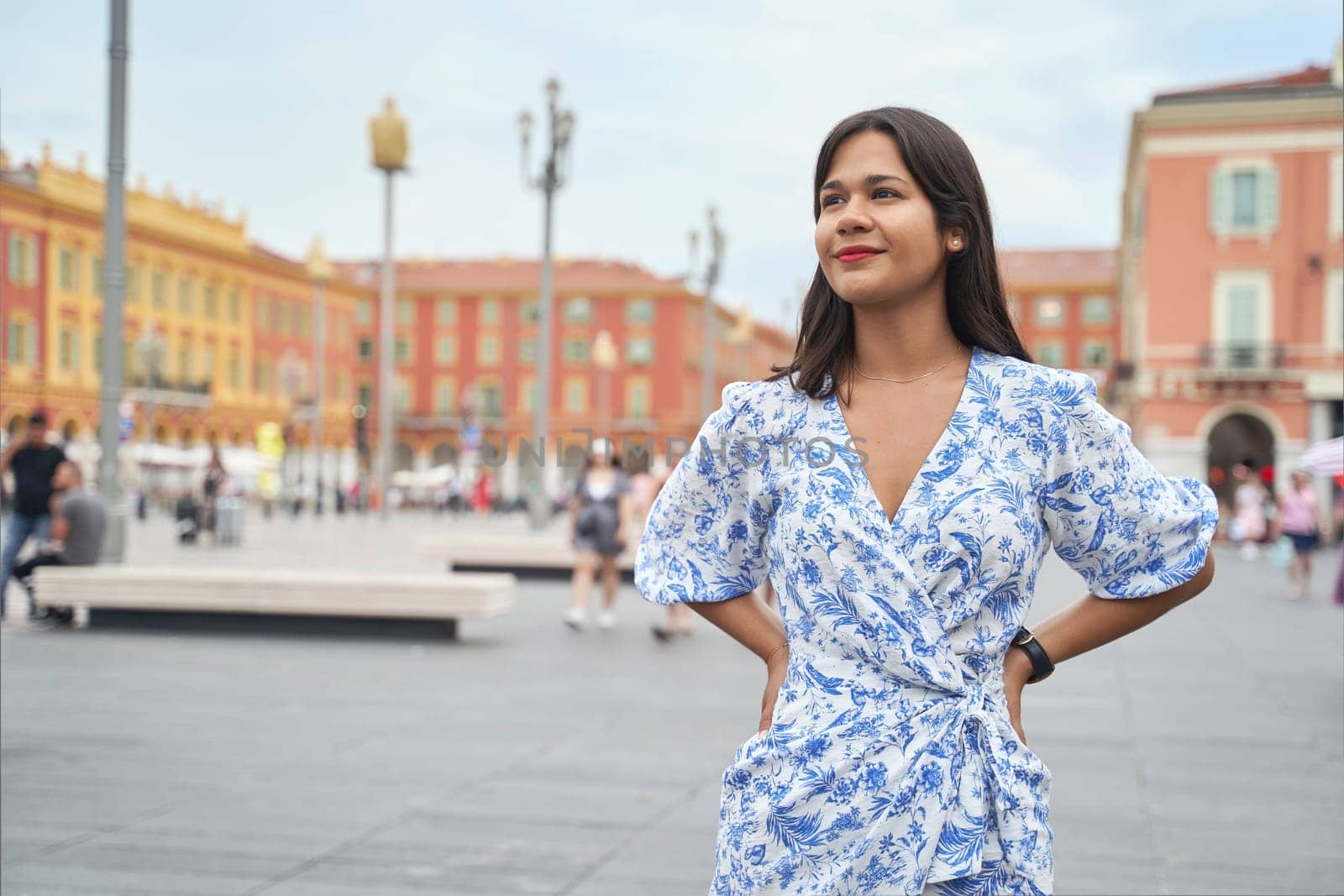 Beautiful young mixed race woman at Place Massena in Nice