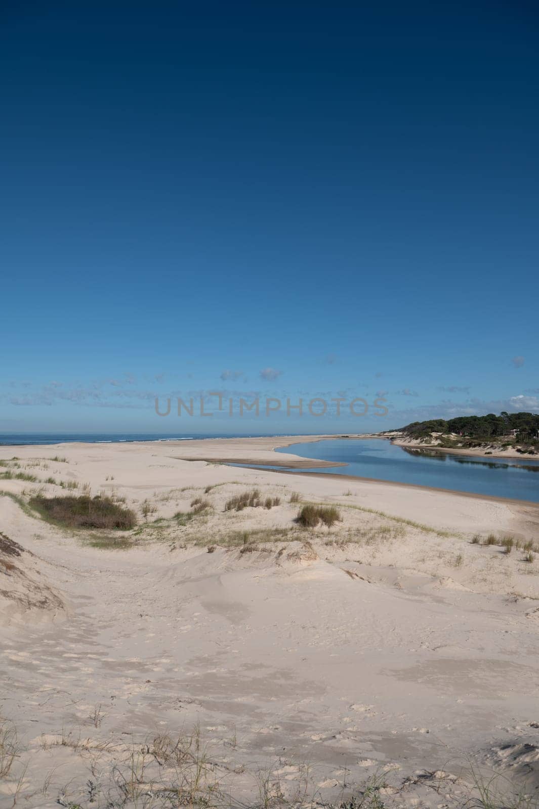 Parque del Plata, Uruguay : 2023 May 3 : Mouth of Arroyo Solis Chico on a sunny day on the Gold Coast in Uruguay.