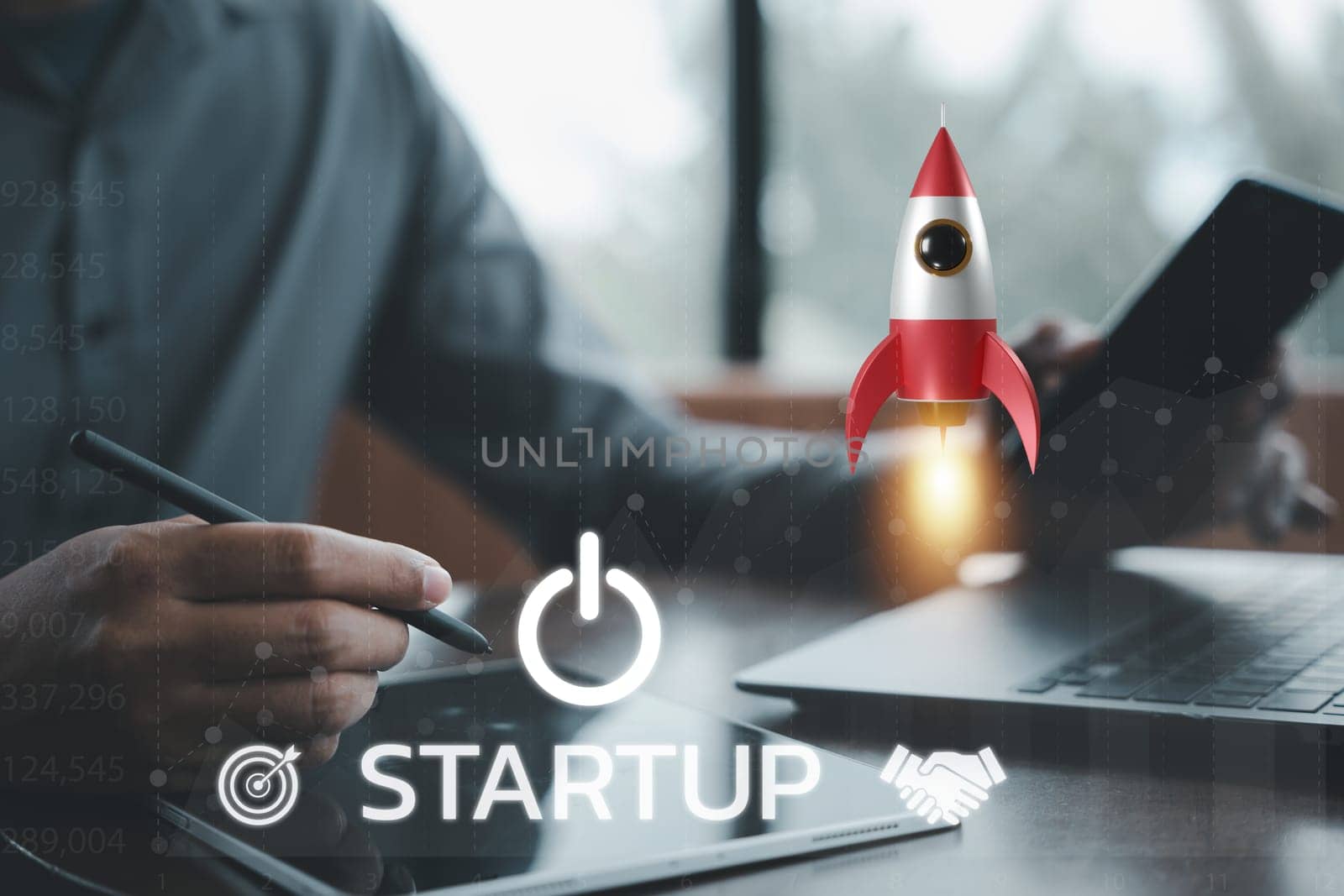 Business startup concept with a rocket icon launching from a laptop by Sorapop