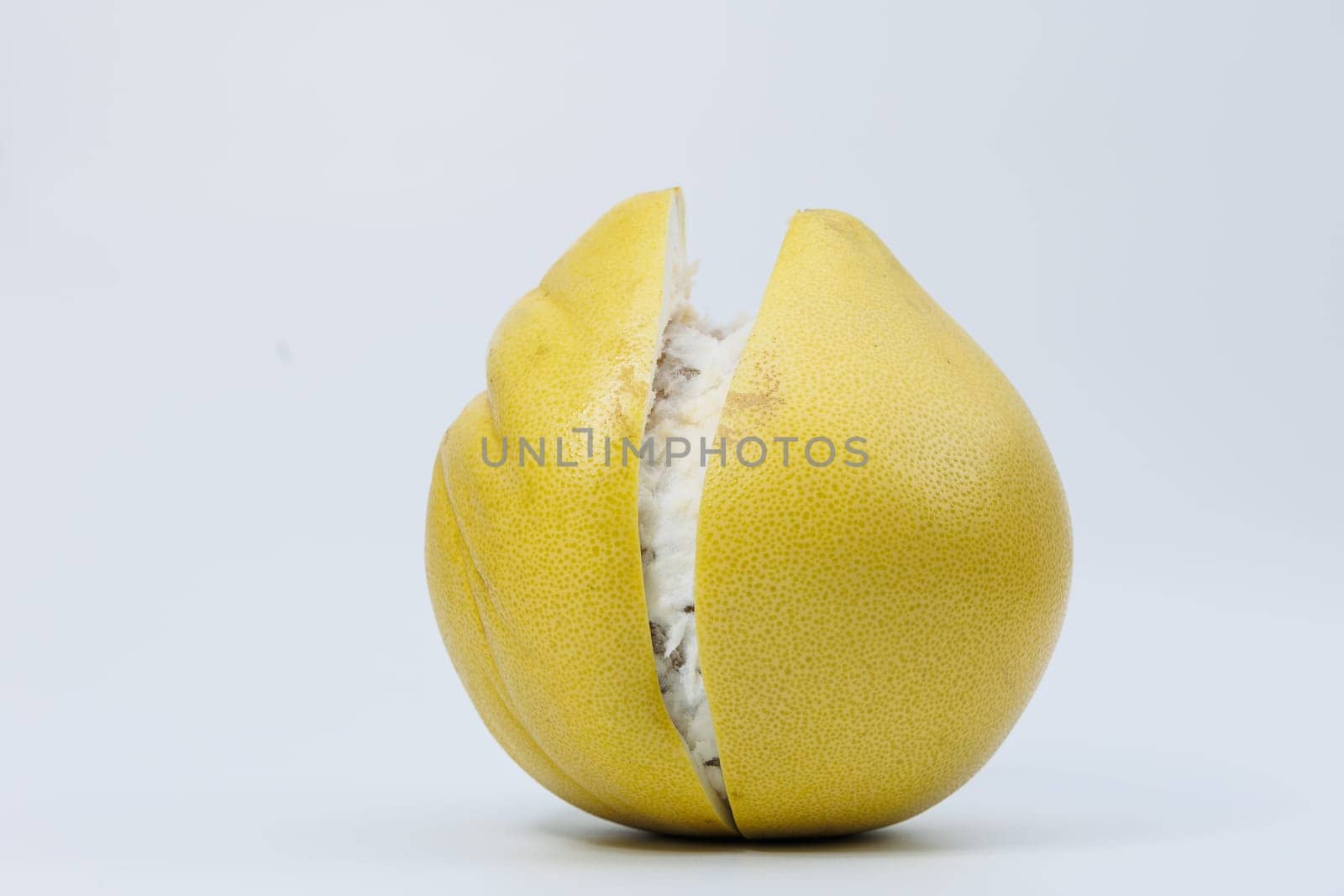 Pomelo fruit isolated on white background, tropical exotic citrus fruit