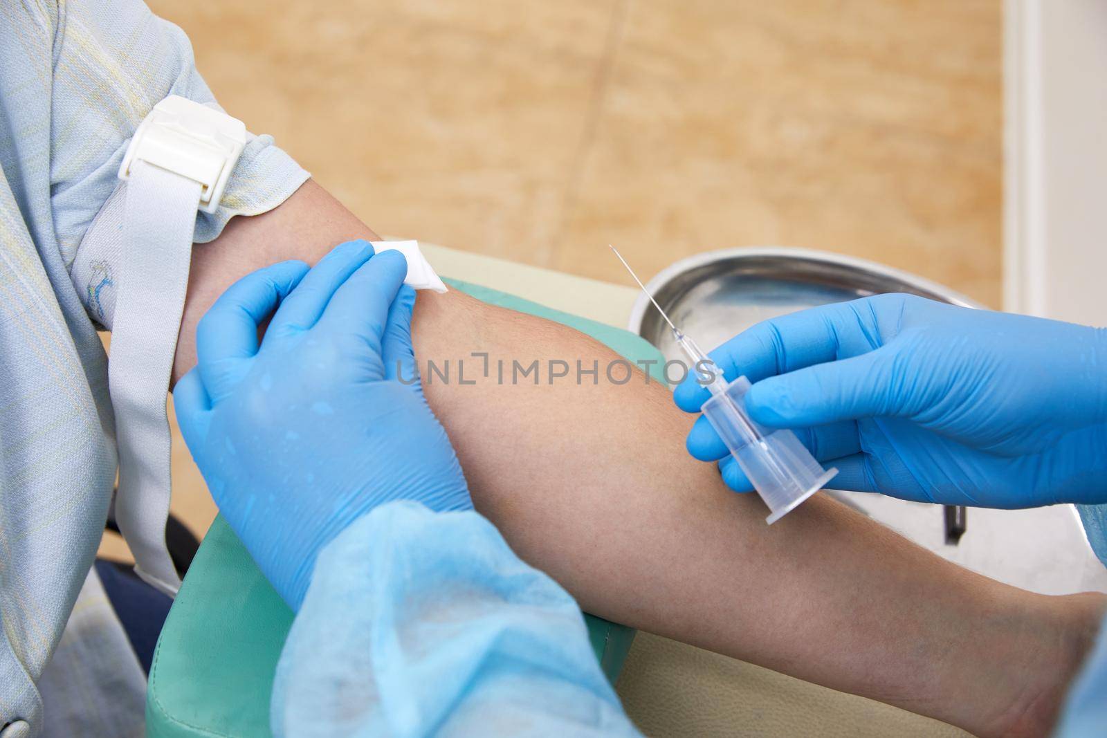 Nurse doing blood test from vein. Covid testing concept